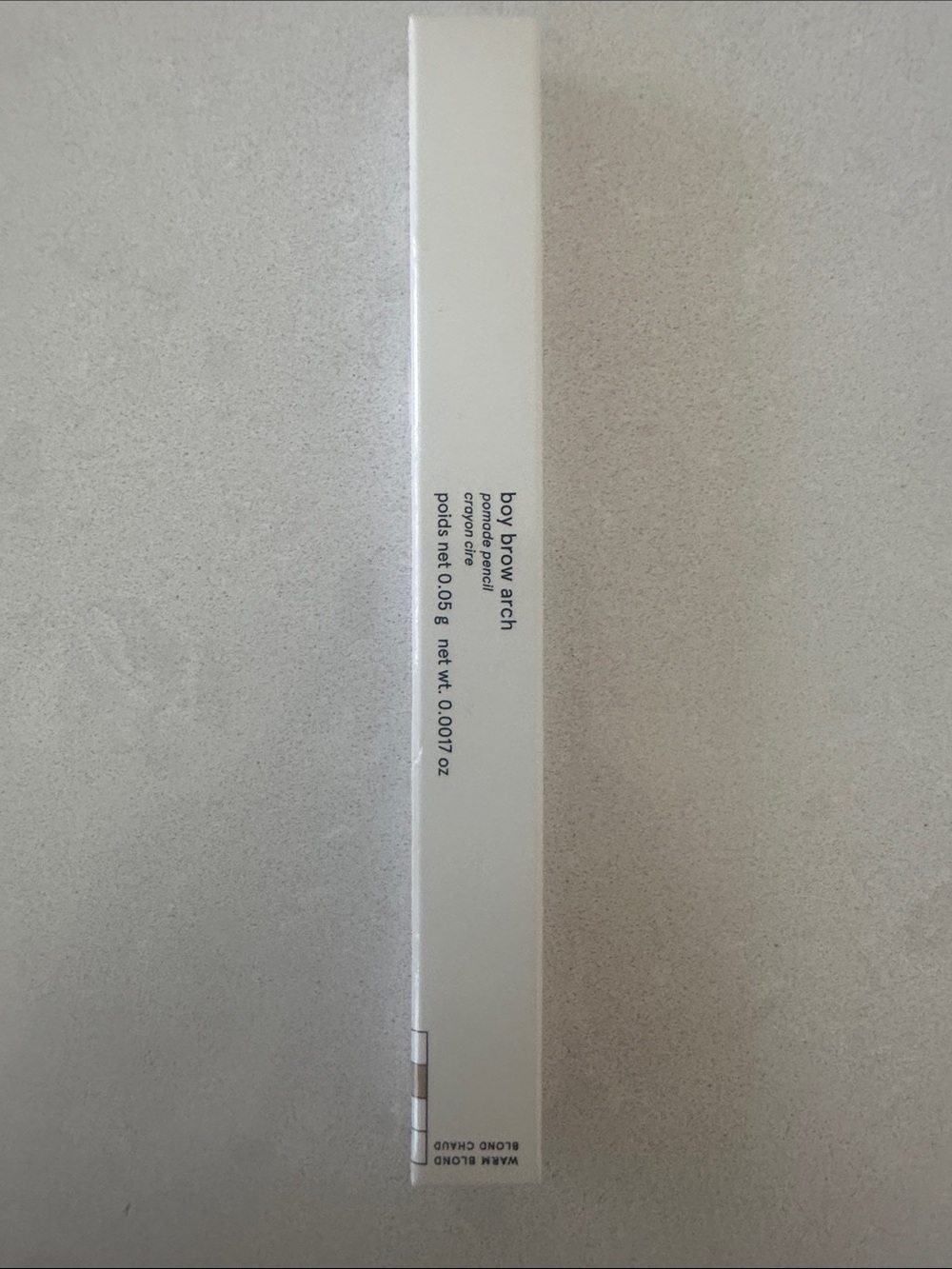 Glossier Boy Brow Arch Brow pencil in warm blond